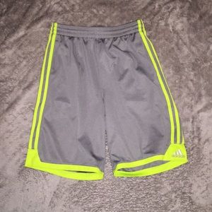 Gray and green adidas shorts
